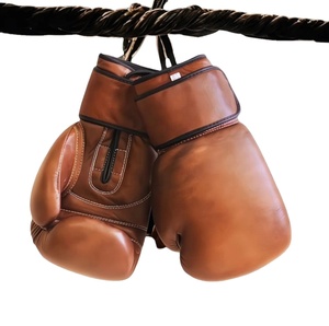 Guantes de boxeo de ajuste regular con impresión de logotipo totalmente personalizado Guantes de boxeo hechos de cuero de alta calidad a la venta - Product Image 1