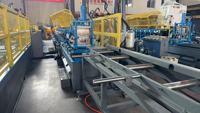 Machine de profilage automatique pour profilés de charpente et montants métalliques