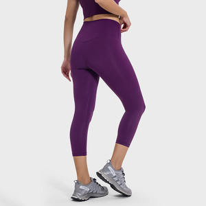 Collants de gymnastique athlétiques pour femmes 3/4 longueur taille haute Capris bout à bout couleurs unies sans couture avant beurre tissu poches sans couture - Product Image 4