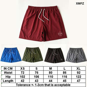 2025 verano ecológico pantalones cortos de malla de entrenamiento para hombres de dos pisos cintura media cintura elástica patrón sólido teñido liso al por mayor - Product Image 3