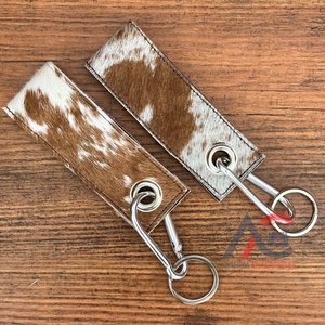 Nuevo 2025 promocional al por mayor mosquetón de cuero de vaca Clips cordón colgador llavero de cuero genuino con hebilla anillo llaveros - Product Image 1