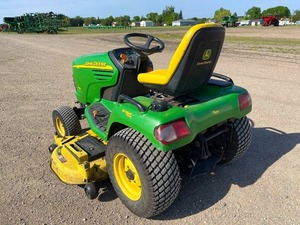 Tondeuse autoportée John Deere X485 verte 2003 avec siège, moteur essence, grande plateforme de coupe pour jardin - Product Image 4