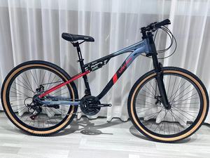 Vélo de montagne confortable à suspension intégrale avec cadre en acier, 21 vitesses, frein à disque, pédale ordinaire, fourche à suspension, haute vitesse - Product Image 4