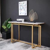 Table console moderne en marbre blanc avec plateau rectangulaire et structure en métal doré pour salon, chambre, entrée, couloir, maison, appartement