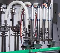Ligne de Production de Machine de Remplissage de Bouteilles à 4 Buses Personnalisée 3000 BPH pour Remplissage, Bouchage et Étiquetage de Miel et Jus