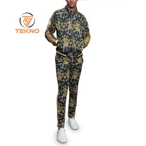 Chándal de sublimación para hombre diseñado con colores brillantes de poliéster premium y ajuste relajado perfecto para deportes o entrenamiento de gimnasio - Product Image 1