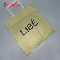 Sacs en papier kraft biodégradables recyclables en gros avec poignée pour emballage de vêtements et artisanat, pelliculage mat, logo personnalisé