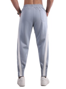 Nuevos pantalones informales de Otoño de talla grande al por mayor, pantalones de chándal holgados para deportes al aire libre, pantalones de hombre con bloqueo de Color a la moda - Product Image 3