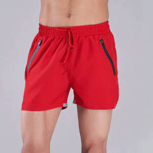 Shorts de sport pour hommes avec poches zippées, taille à cordon de serrage et tissu léger et respirant de haute qualité - Product Image 1