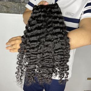 Precio al por mayor 100% extensiones de cabello rizado birmano virgen cruda hechas en Vietnam - Product Image 1