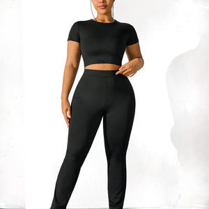 Conjunto de ropa deportiva de gimnasio de alta elasticidad personalizada para mujer, camiseta transpirable de manga corta, mallas, tela de costilla sólida, botón de encaje para correr - Product Image 1