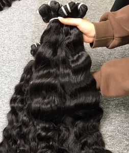 Los mejores vendedores de Vietnam ofrecen extensiones de cabello ondulado natural virgen sin procesar cabello humano crudo suave con cutícula alineada - Product Image 1