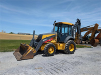 Chargeuse-pelleteuse Deere 410K d'occasion 2014, 4x4, capacité de charge nominale de 100 tonnes, moteur, fourches à attache rapide, cabine, chauffage, climatisation, offre limitée