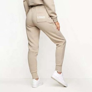 Chándal de invierno personalizado de alta calidad OEM para mujer, conjunto de 2 piezas, Top corto con capucha y pantalones de chándal, chándal en blanco para correr para mujer - Product Image 5