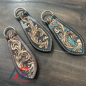 ที่หนีบหมวกแม่เหล็กทำจากหนัง2025ใหม่มีสายรัดหมวกแกะสลักลายดอกไม้ตะวันตกที่จับหมวกแม่เหล็กติดกระเป๋าและเข็มขัด - Product Image 1