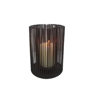 Hollow iron black candle lanterns which make the perfect addition to your coffee table decor