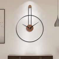 Horloge murale contemporaine en métal noir mat WB INC, mouvement analogique à quartz, aiguilles mécaniques, motif géométrique abstrait, style antique