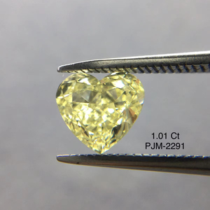 เพชรรูปหัวใจสุดสุกใสผ่านการรับรองคุณภาพเพชรสีเหลืองแฟนซีขนาด1.01กะรัตเพชรหลวมธรรมชาติใส VS2ได้รับการรับรองจากอินเดีย - Product Image 1