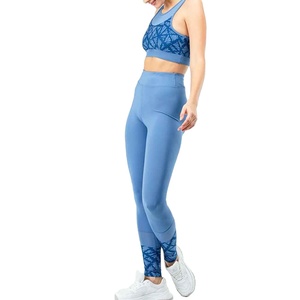 Ensemble de yoga pour femme à séchage rapide, taille élastique, col rond, couleur unie, logo sur le devant, matière Spandex/Polyester, ensemble 2 pièces respirant - Product Image 1