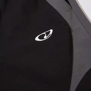 Pantalones de chándal holgados para hombre al por mayor, pantalones de nailon poliéster colorblock, bolsillo frontal táctico, secado rápido, elásticos y ligeros - Product Image 3