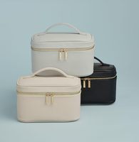 Tas Kosmetik Travel Portabel Kapasitas Besar Logo Kustom Ritsleting Ganda Kulit PU Tas Makeup Fashion untuk Wanita