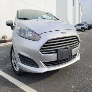 FORD FIESTA 2018 USADO EN EXCELENTES CONDICIONES, 6 VELOCIDADES, SE HATCHBACK, EXTERIOR PLATEADO, MOTOR 1.6L DE 120 HP, TRACCIÓN DELANTERA DE 14 PULGADAS, SISTEMA DE TRANSMISIÓN DE ALTO RENDIMIENTO - Product Image 1