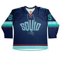 Jersey Hoki Es Desain Kustom OEM, Bendera Cetak Kustom, Nama/Nomor Tackle Twill Kustom, Warna Kustom, Logo untuk Klub, Tim, Liga
