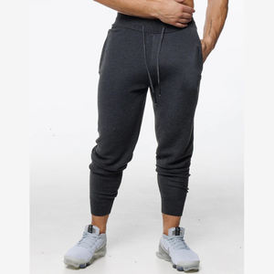 Nuevo conjunto de ropa de gimnasio personalizada XXL para hombre, pantalones de chándal de lana regulares con bolsillo con capucha, pantalones de chándal al por mayor, pantalones de Jogger de talla grande - Product Image 1