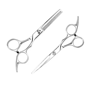 Le guide ultime pour choisir les ciseaux de coiffeur Type d'acier, conception de lame, équilibre, confort de la poignée, longévité - Product Image 2