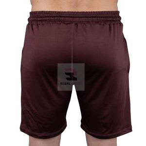 Pantalones cortos atléticos para hombre con cintura elástica Pantalones cortos de estilo casual de patrón sólido transpirable con bolsillos - Product Image 4