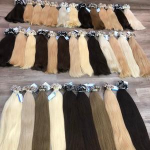Venta al por mayor 50% Extensiones de cinta de cabello virgen vietnamita de gran orden con máquina Trama doble Todos los colores y longitudes - Product Image 1