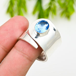 Anillo de Plata Chapado con Topacio Azul Sintético de Forma Ovalada de 10x14 mm, Gema Elegante para Mujer - Product Image 1
