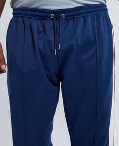 Alta calidad logotipo personalizado Terry 100% algodón sólido en blanco pantalones de chándal costuras en contraste pantalones de chándal holgados para hombres - Product Image 1