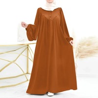 Nouveau musulman printemps et automne mode décontracté bulle à manches longues Simple couleur unie col rond bouton femmes combinaison longue robe