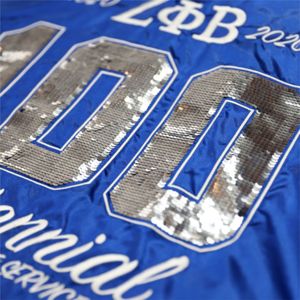Veste à paillettes ZPB Centennial-Bleu | Veste Zeta Phi Beta 100e anniversaire 100% polyester avec détails brodés et paillettes - Product Image 4