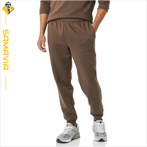 Stock disponible pantalons pour hommes avec poches tricotées taille élastique logo personnalisé pantalons de survêtement imperméables respirants coupe-vent OEM - Product Image 1