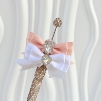 Stylo à bille de luxe avec nœud en strass, cœur en cristal et pavé de diamants, ensemble d'accessoires perlés faits à la main, cadeau pour l'école et le bureau, vente en gros