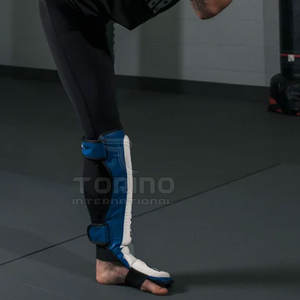 สนับแข้งหนังคุณภาพสูงรุ่นใหม่ล่าสุด เป็นมิตรกับสิ่งแวดล้อม ปรับขนาดและสีได้ตามต้องการ ดีไซน์ทันสมัย กำลังเป็นที่นิยมสำหรับการฝึกซ้อมมวย - Product Image 6