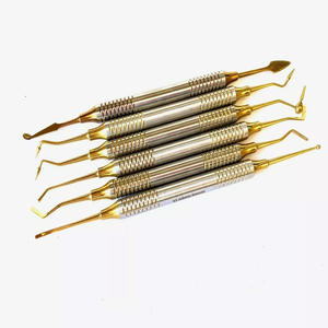 Instrumento quirúrgico de relleno compuesto dental Kit de restauración recubierto de oro 6 PCS - Product Image 1