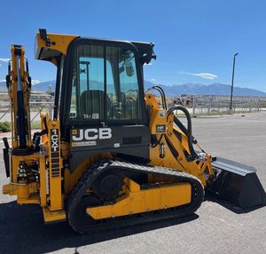 รถตักล้อยาง JCB รุ่น 1CXT มินิสกิดสเตียร์ พร้อมบุ้งกี๋หน้า สำหรับรถตักขนาดเล็ก JCB 1CX ขาย - Product Image 1