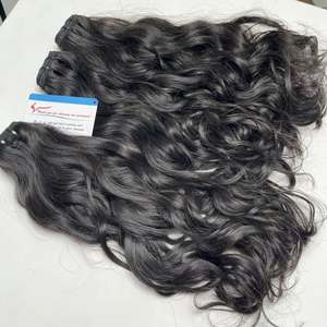 Prix de gros usine cheveux ondulés naturels trame couleur noire 100% extensions de cheveux vietnamiens de haute qualité - Product Image 1
