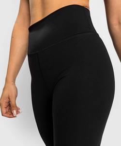 Mallas de Yoga de cintura media para mujer 2025 con estampado de leopardo, tela satinada, bolsillos transpirables con logotipo personalizado para gimnasio - Product Image 3