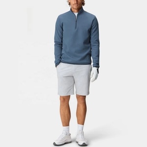 . Pull-over de golf flexible à fermeture éclair fait pour les heures de départ et les séances d'entraînement tôt le matin avec évacuation de l'humidité - Product Image 1