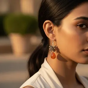 Boucles d'oreilles pendantes papillon pour femme en argent 925 avec cornaline et quartz fumé - Product Image 1