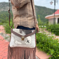 Nouveau Style occidental cheveux sur cacher fourrure en cuir véritable frange sacs haute qualité Boho Style femmes en cuir véritable frange sacs à bandoulière