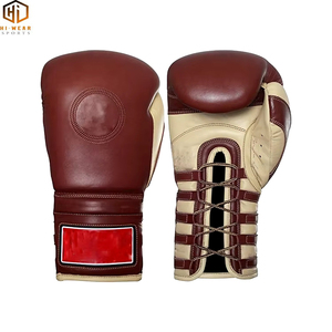 Guantes de boxeo de entrenamiento de combate personalizados profesionales Guantes de boxeo de cuero real con cordones - Product Image 1