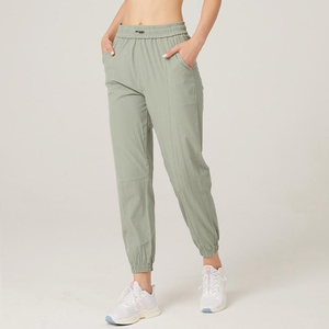 Joggers de cintura elástica alta para mujer, pantalones de Yoga de entrenamiento de patrón sólido de estilo frontal plano con cierre ajustable para invierno - Product Image 1