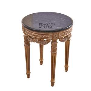 Table d'appoint ronde de luxe avec plateau en marbre noir et cadre en bois sculpté à la main avec feuilles d'or pour une décoration classique de la maison - Product Image 1