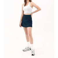 Jupe de tennis mini décontractée respirante pour femme, avec short intégré, taille basse, 100 % coton, plissée, poches, pour activités de plein air