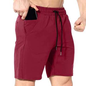 Pantalones cortos bordados de algodón y poliéster 100% para hombre, ropa con cordón de patrón sólido transpirable de secado rápido a la venta - Product Image 1